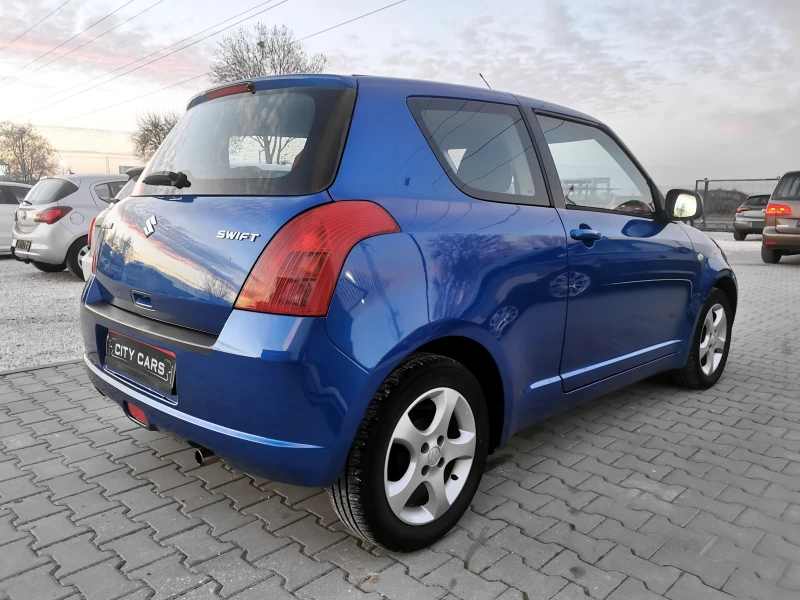 Suzuki Swift 1.3, снимка 9 - Автомобили и джипове - 52838436