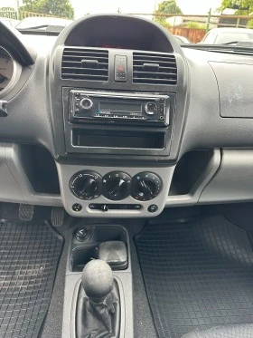 Suzuki Ignis 1.5i 99kc 4x4 - [12] 