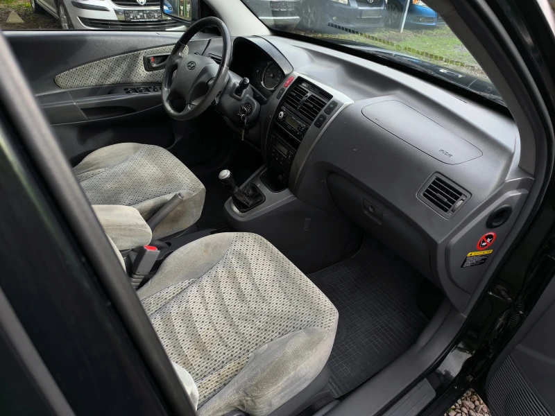 Hyundai Tucson -2.0CRDI-113кс-4х4-КЛИМАТРОНИК-, снимка 14 - Автомобили и джипове - 52494008