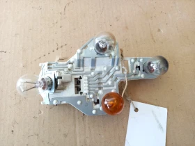 Основа десен стоп Рено Лагуна (1)