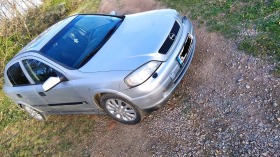 Opel Astra, снимка 1 - Автомобили и джипове - 45327178