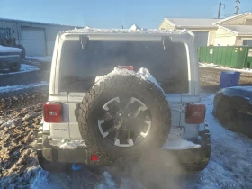 Jeep Wrangler 2l Rubicon 4Xe - 48800 € / 95444.50 лв. - 95022758 6