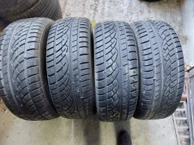 Гуми Зимни 255/70R15, снимка 1 - Гуми и джанти - 39124040