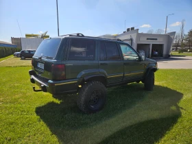 Jeep Grand cherokee 5.2, снимка 4