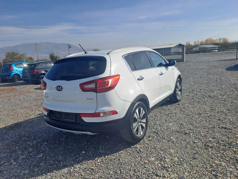 Kia Sportage 2.0CRDI 4X4, снимка 4 - Автомобили и джипове - 47777788