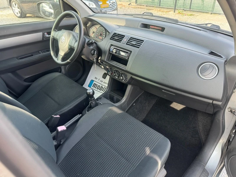 Suzuki Swift 1.3i EURO 4, снимка 11 - Автомобили и джипове - 46181085