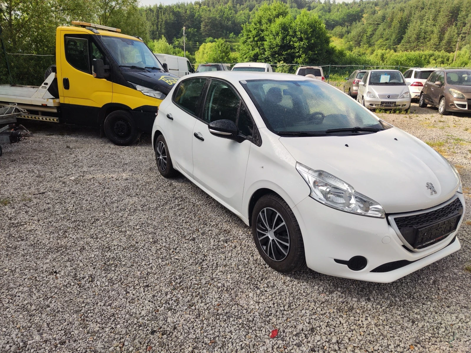 Peugeot 208 1000 I 68 к.с. - изображение 7