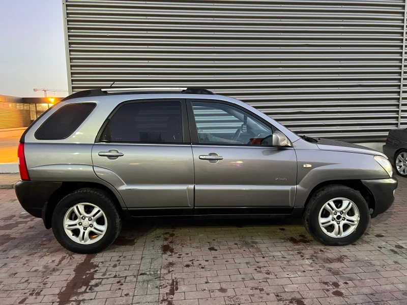 Kia Sportage, снимка 8 - Автомобили и джипове - 52404151