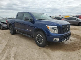 Nissan Titan crew cab 5.6L 8 * SV * AWD, снимка 1