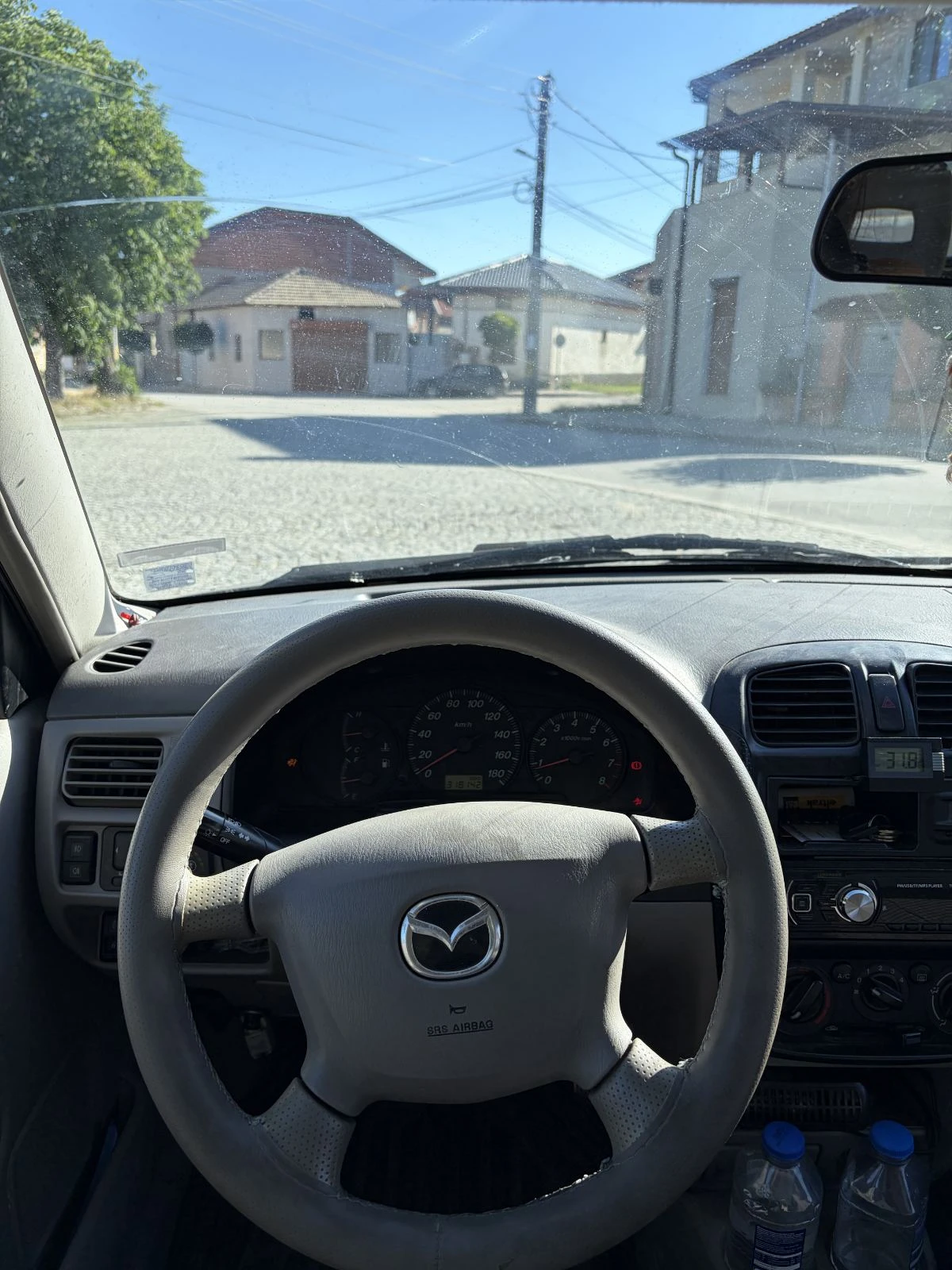 Mazda Demio, снимка 11 - Автомобили и джипове - 55225609