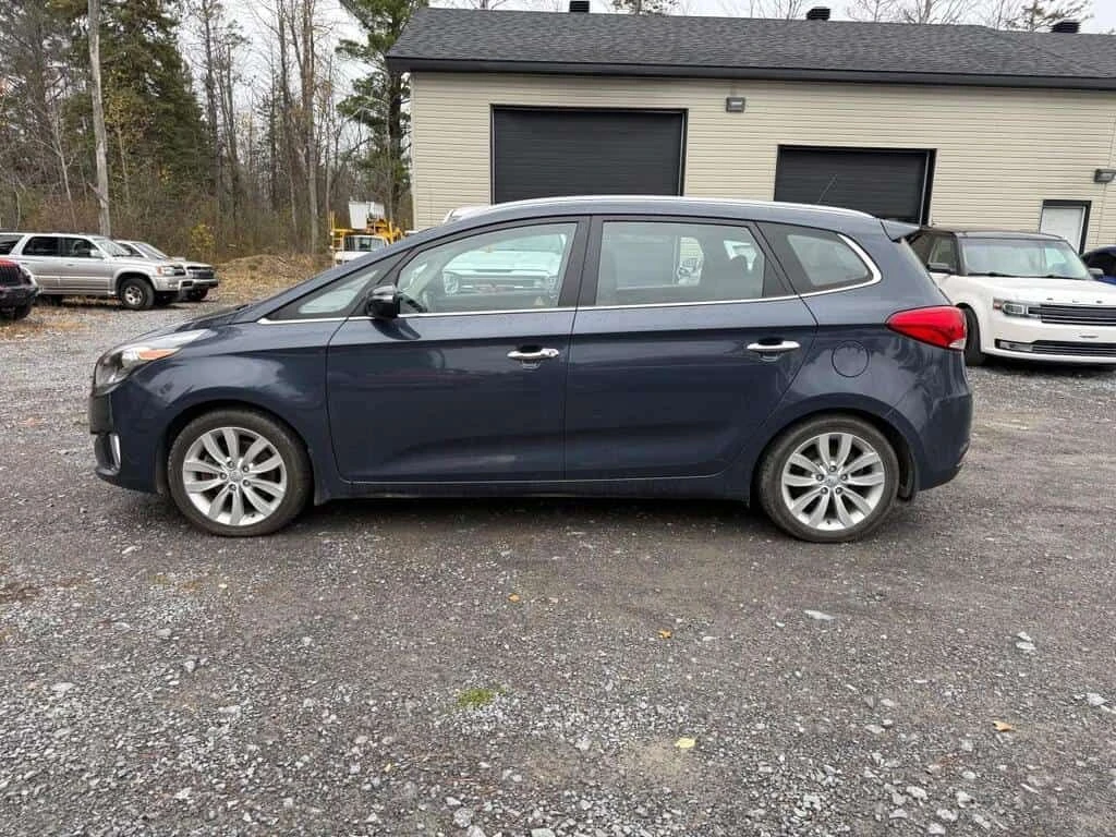 Kia Sedona * FWD | EX | HTD SEATS | REAR CAM | WAGON * CARFAX, снимка 2 - Автомобили и джипове - 53921801