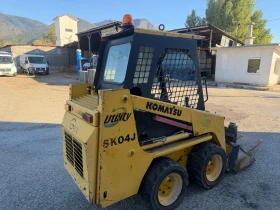 Мини челни товарачи Komatsu Sk04, снимка 3
