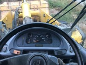   Komatsu WA320-      | Mobile.bg    9