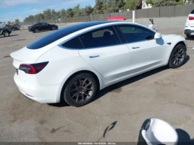 Tesla Model 3 Standard Range Plus, снимка 4