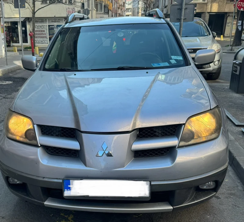 Mitsubishi Outlander 2.4 бензин+ газ, снимка 6 - Автомобили и джипове - 48967735