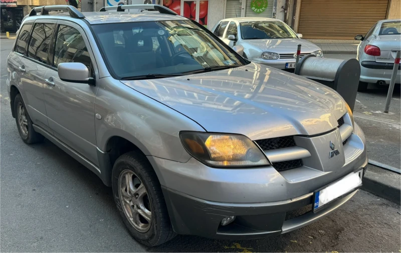 Mitsubishi Outlander 2.4 бензин+ газ, снимка 5 - Автомобили и джипове - 48967735