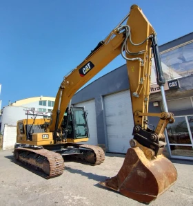 Багер Cat 320GC