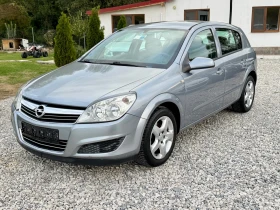     Opel Astra 1.6  224000 