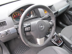 Opel Astra, снимка 12 - Автомобили и джипове - 43710589