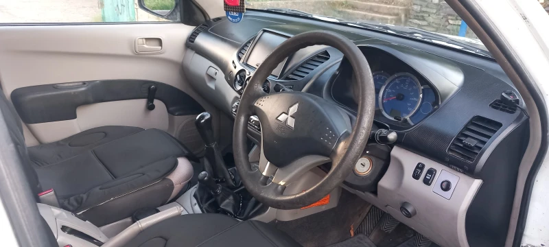 Mitsubishi L200, снимка 7 - Автомобили и джипове - 52909699