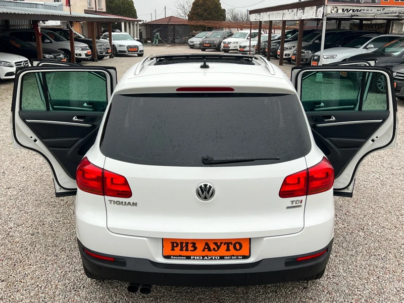 VW Tiguan 2.0TDI* PANORAMA* 6sk* MULTI VOLAN* PODGREV* NAVI, снимка 11 - Автомобили и джипове - 52892217
