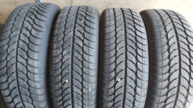 Гуми Зимни 185/60R14, снимка 1 - Гуми и джанти - 29260024