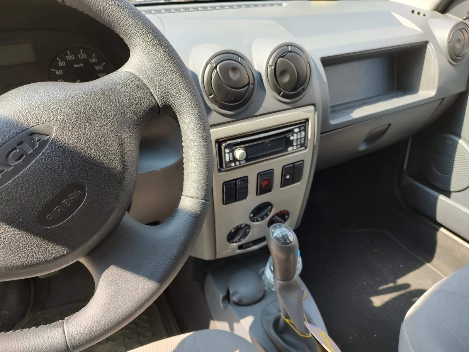 Dacia Logan 1.4 MPI, снимка 9 - Автомобили и джипове - 56165294