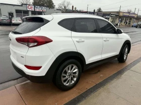 Hyundai Tucson AWD 4dr 2.0L Premium - 11850 € / 23176.59 лв. - 13543457 7