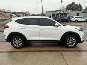 Hyundai Tucson AWD 4dr 2.0L Premium - 11850 € / 23176.59 лв. - 13543457 8