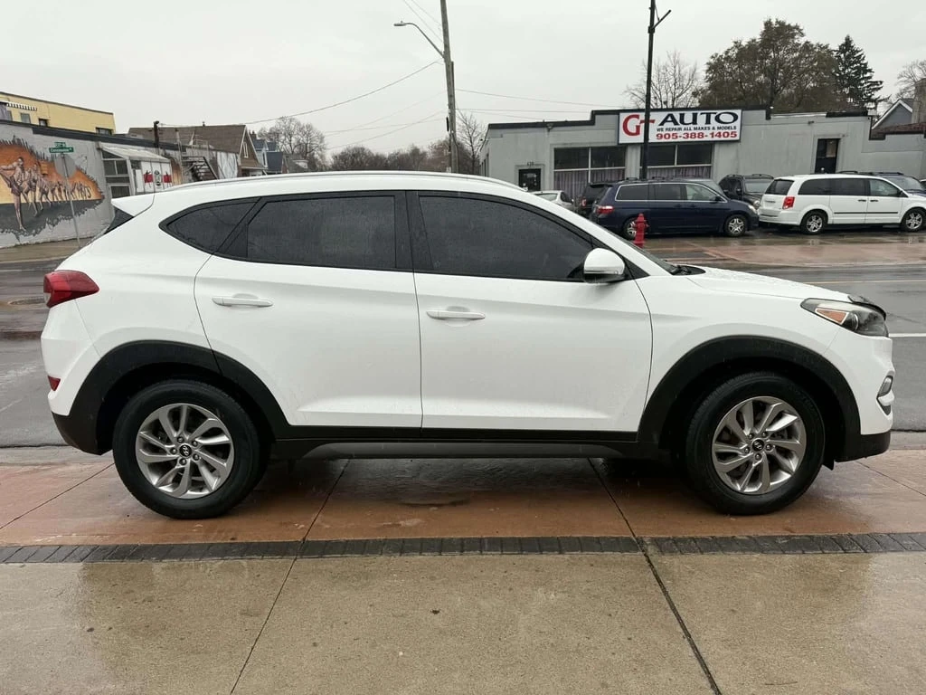 Hyundai Tucson AWD 4dr 2.0L Premium - изображение 8