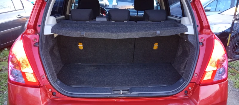 Suzuki Swift 1.3i 4X4 FACELIFT , снимка 13 - Автомобили и джипове - 52886427