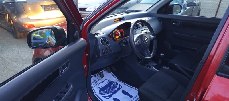 Suzuki Swift 1.3i 4X4 FACELIFT , снимка 8 - Автомобили и джипове - 52886427