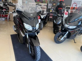     Yamaha X-max 250cc. 2013