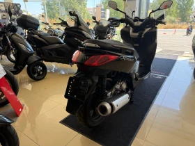     Yamaha X-max 250cc. 2013