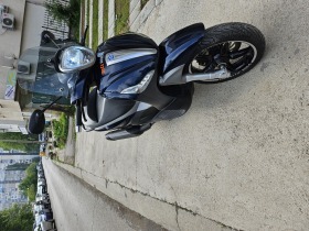 Piaggio Beverly ST, снимка 17 - Мотоциклети и мототехника - 45483101