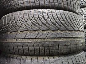 Гуми Зимни 245/45R18, снимка 1 - Гуми и джанти - 48962543