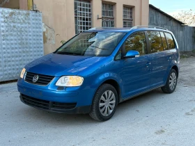 Обява за продажба на VW Touran 2.0TDI ~5 300 лв. - изображение 1 | Auto.bg Обява за продажба на VW Touran 2.0TDI ~5 300 лв. - изображение 1