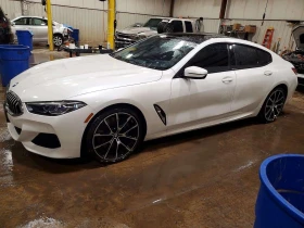 ������ BMW 840