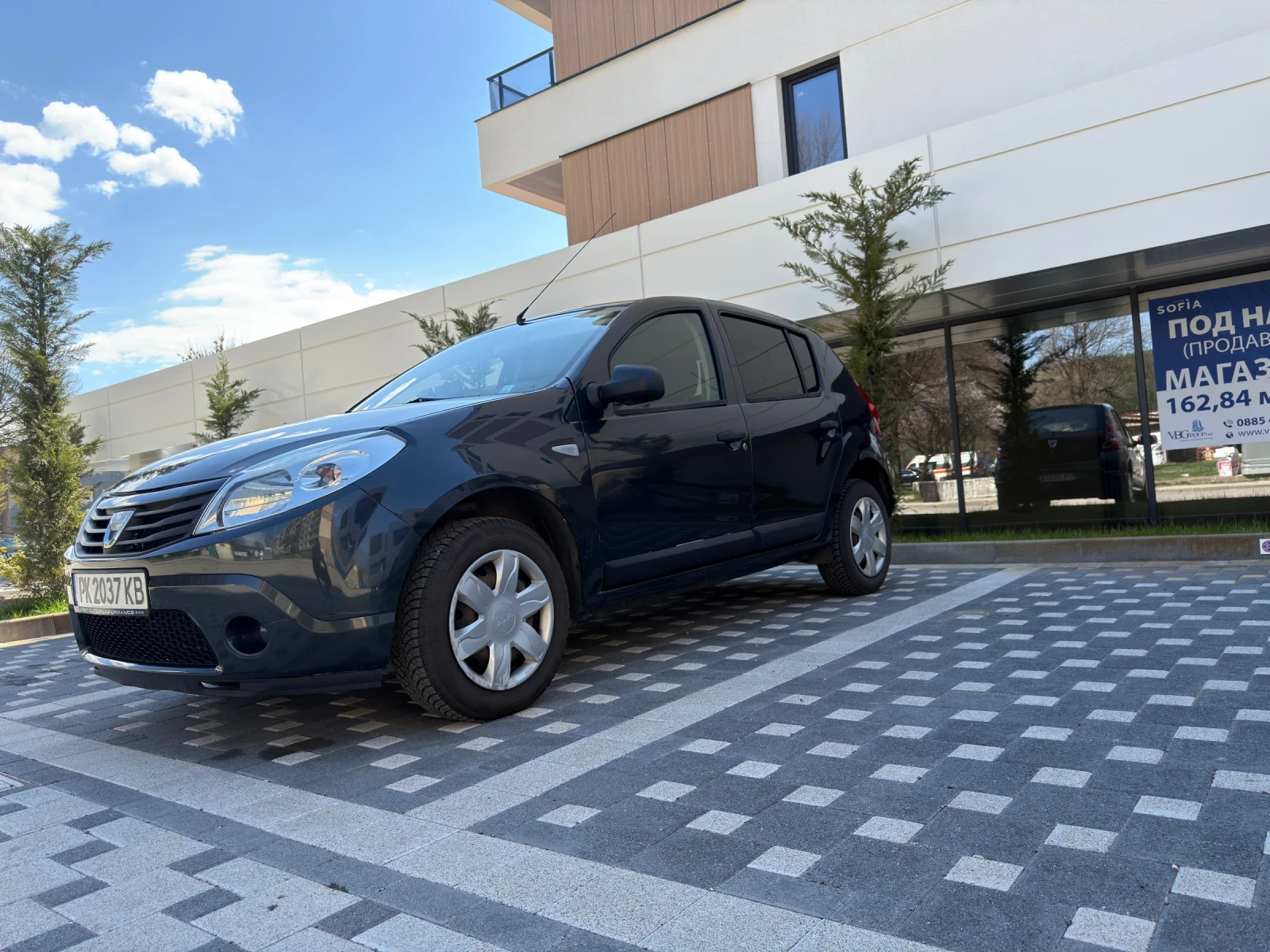 Dacia Sandero SWISS , снимка 11 - Автомобили и джипове - 54125947