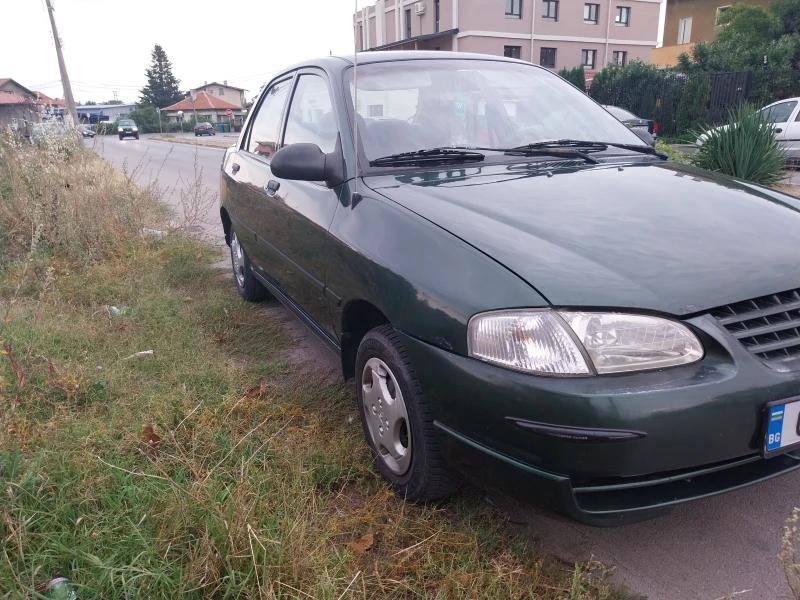 Kia Avella delta 1.6 газ клима , снимка 6 - Автомобили и джипове - 51840220