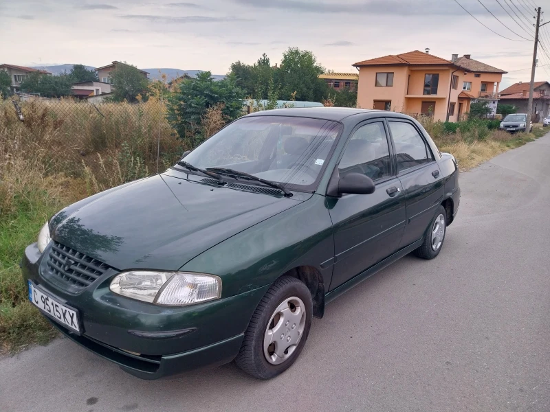 Kia Avella delta 1.6 газ клима , снимка 5 - Автомобили и джипове - 51840220
