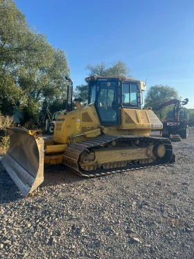   Komatsu