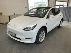 ������ Tesla Model Y