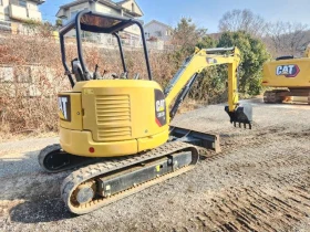      Cat 303.5E2CR -  !!!