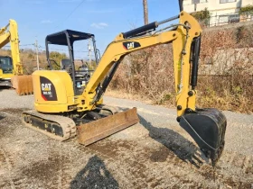      Cat 303.5E2CR -  !!!