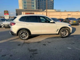 BMW X5 * xDrive40i * ПОДГРЕВИ * 360 * PANO * CARFAX - 40550 € / 79308.91 лв. - 36535411 12