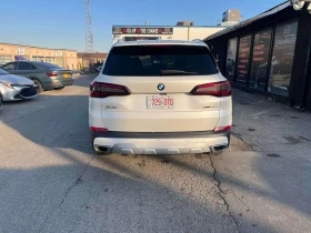 BMW X5 * xDrive40i * ПОДГРЕВИ * 360 * PANO * CARFAX - 40550 € / 79308.91 лв. - 36535411 4