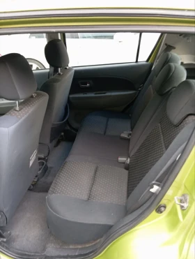 Daihatsu Sirion 1.3 wwt 4x4 , снимка 7