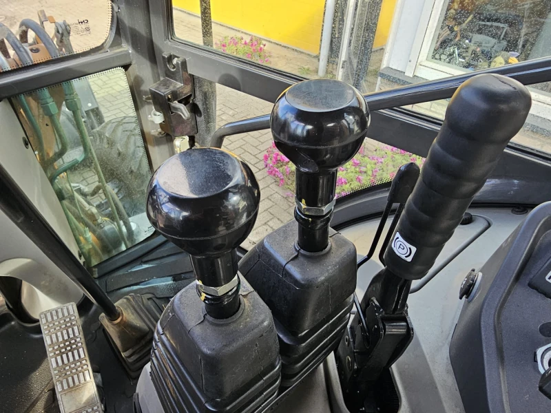 Багер Case 570 SV, снимка 13 - Индустриална техника - 51691229