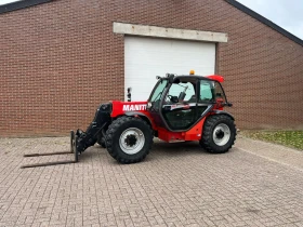 Телескопични товарачи Manitou MLT 742, снимка 12